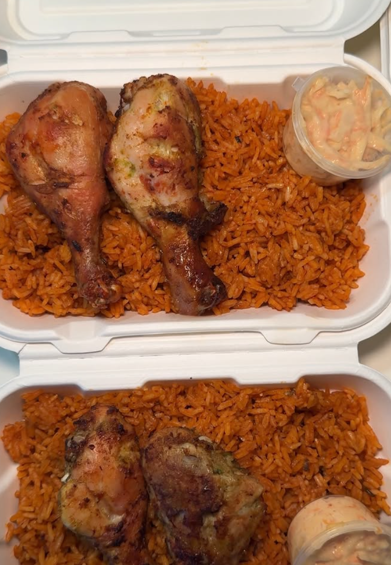 The Juls Cuisine jollof rice boxes with grilled chicken drumsticks and coleslaw
